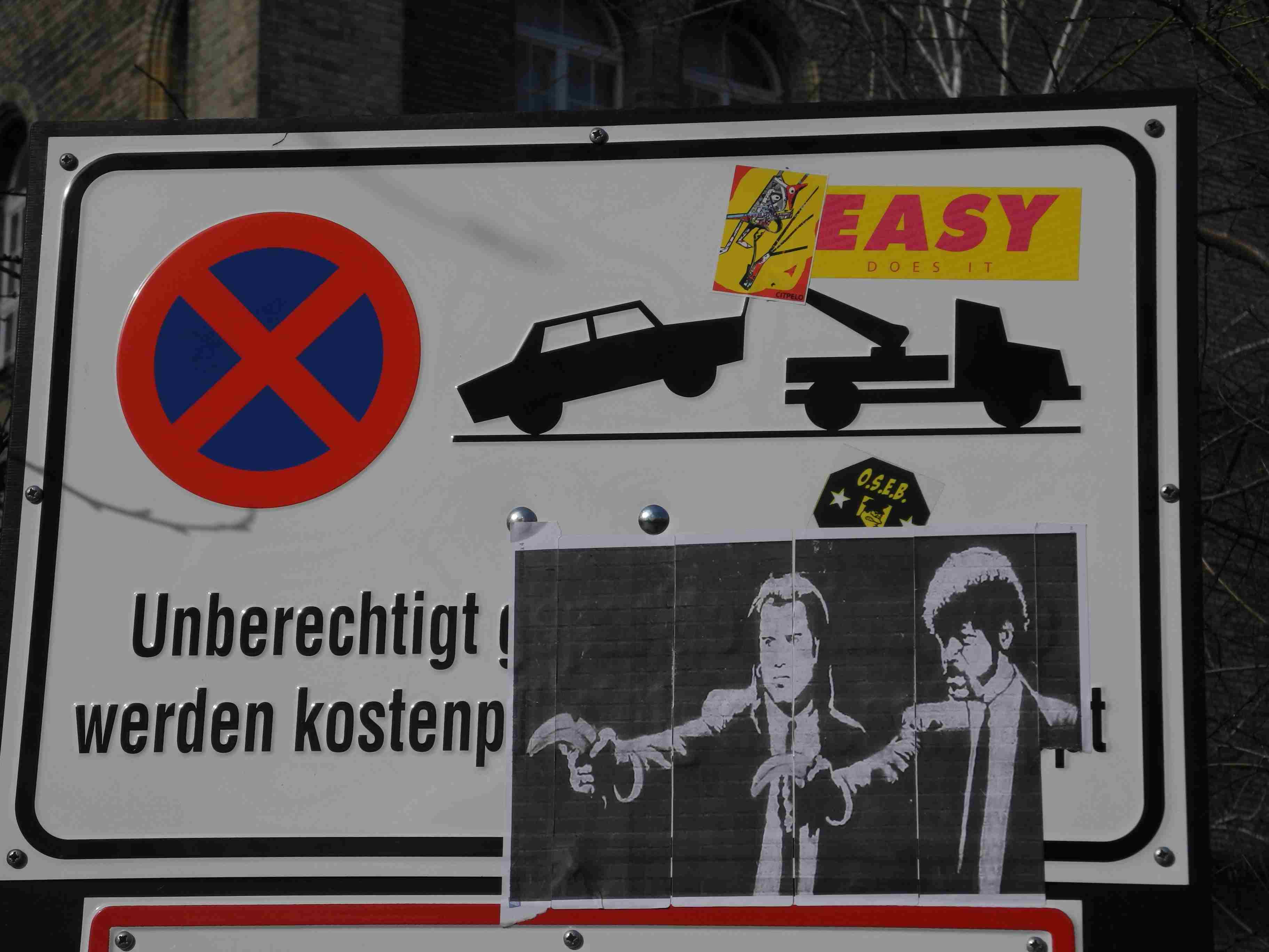 easy_does_it_stickers_on_streetsigns